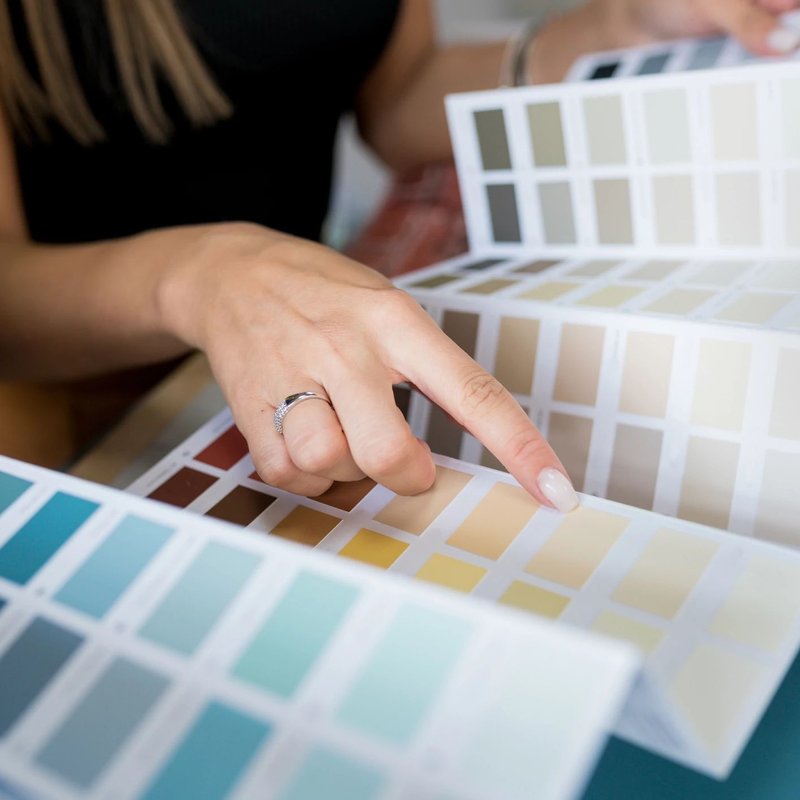 people choosing colors from Domenic and Sons Floor Covering in Johnston, RI