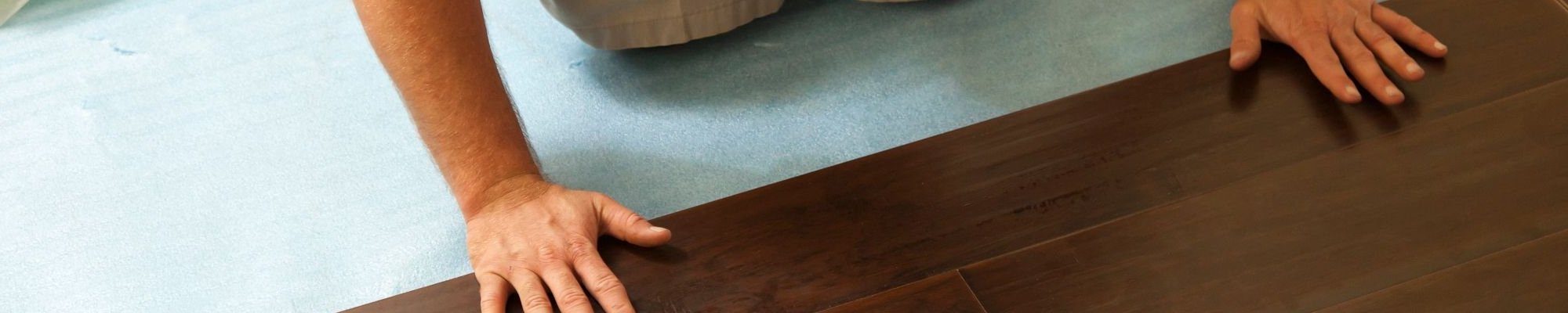 person installing flooring from Domenic and Sons Floor Covering in Johnston, RI