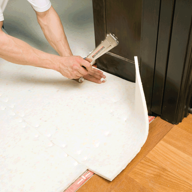Installing carpet from Domenic and Sons Floor Covering in Johnston, RI