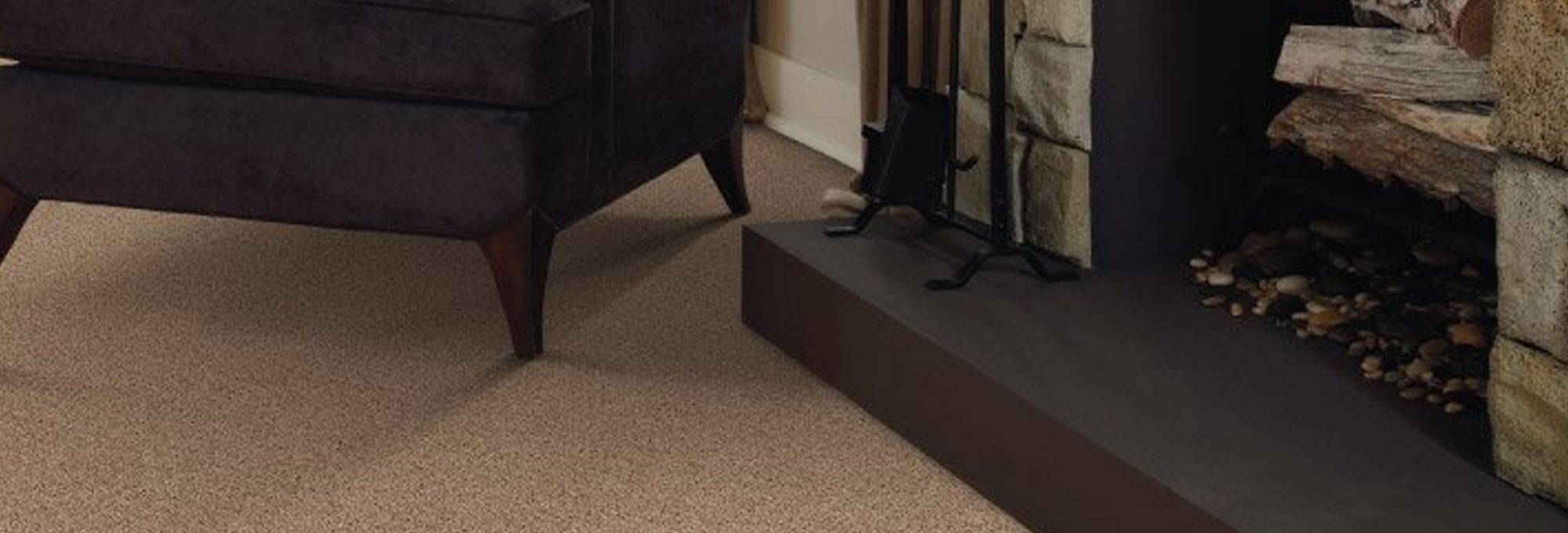 chair next to fireplace from Domenic and Sons Floor Covering in Johnston, RI